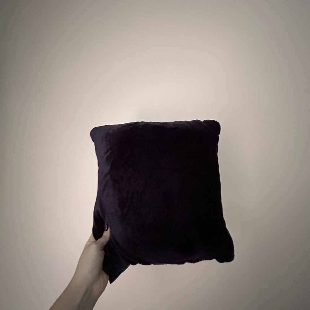 Small deep purple decorative pillow